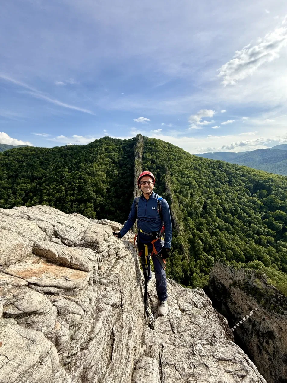 Anup Sheshadri on a mountain trail