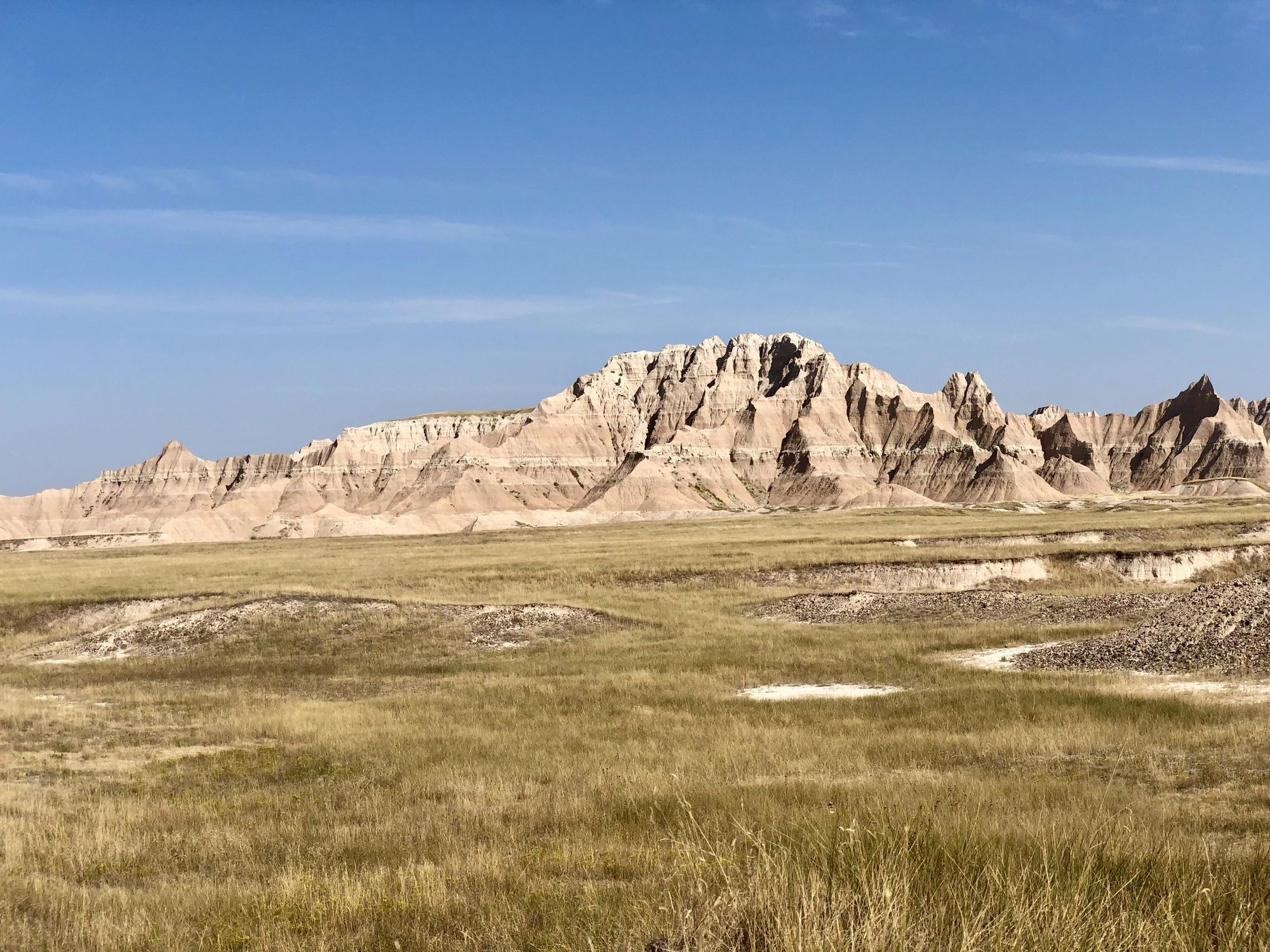 Striped ridges giving way to prairie, the two halves of this place.