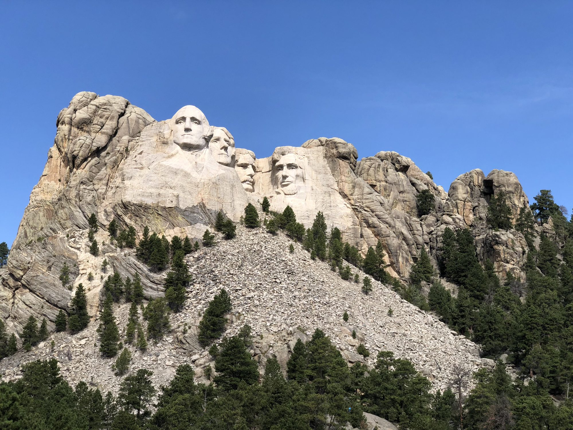 The four faces at Mount Rushmore, the trip's quiet bookend
