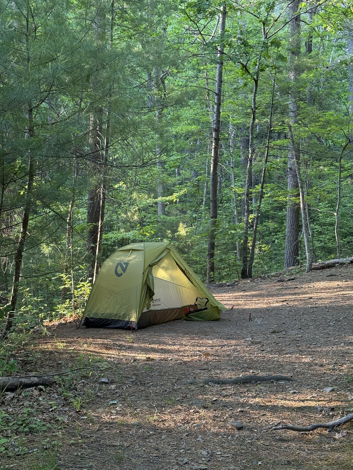 The single-person tent, pitched near the swim holes